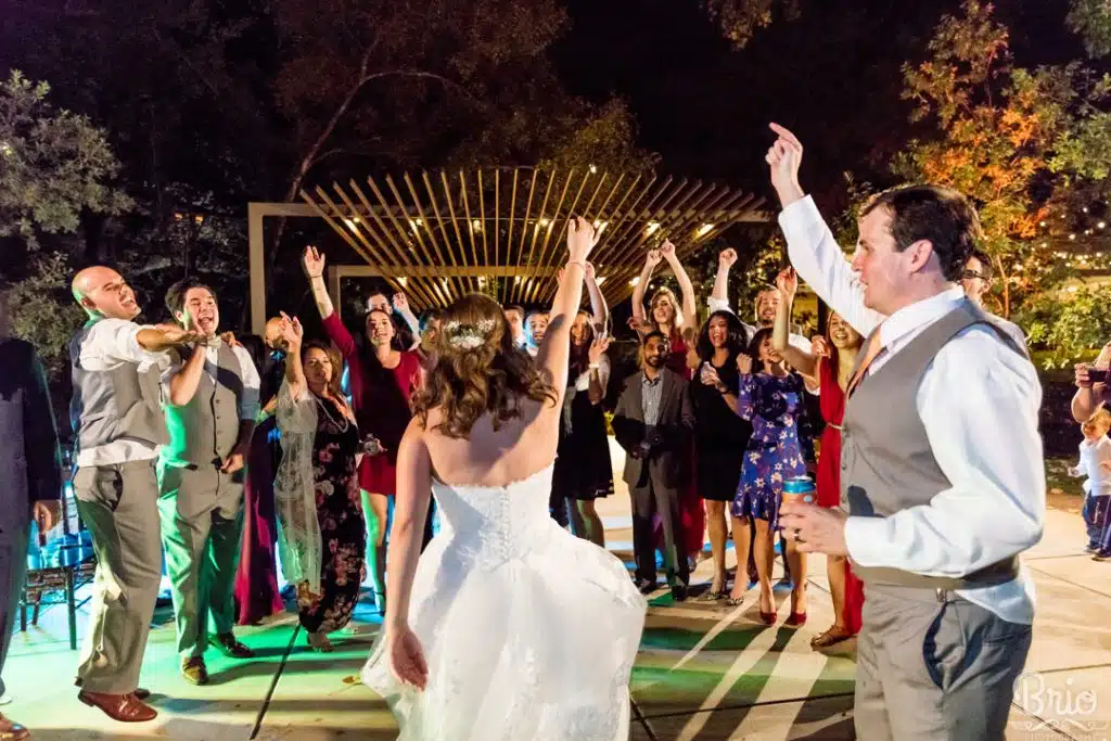 couple and guests at wedding reception